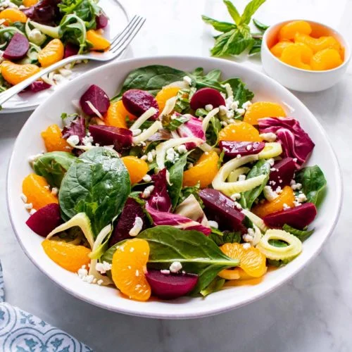 https://dolesunshine.com/wp-content/uploads/sites/2/2022/03/Beet-Fennel-and-Mandarin-Salad.7-500x500.jpg.webp