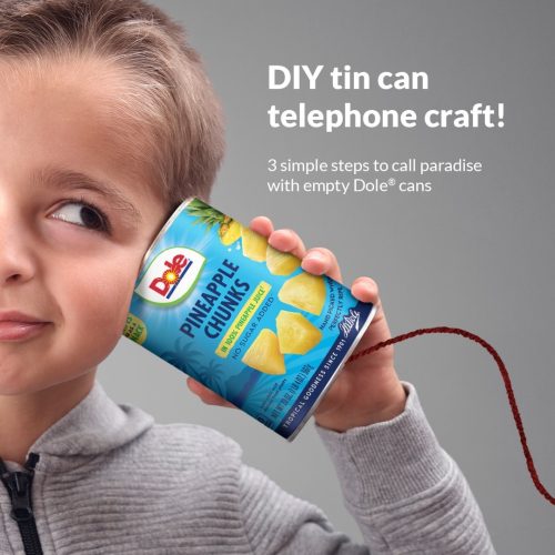 Ready to give your empty Dole<sup>®</sup> cans a new life? Before recycling our cans, try making a DIY telephone!
Step 1: Remove the tops from two empty Dole<sup>®</sup> cans.
Step 2: Create a small hole in the center of the bottoms of the cans.
Step 3: Put either end of a string into each can and tape it into place.
Step 4: Make sure the cans are held out so the wire is taut, and start chatting!Did you give this craft a try? Let us know in the comments! Once you’re done with your wire telephone, be sure to recycle the cans!